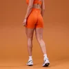 MP дамски безшевни къси шорти Tempo Seamless Scrunch - оранжево
