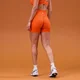 MP дамски безшевни къси шорти Tempo Seamless Scrunch - оранжево